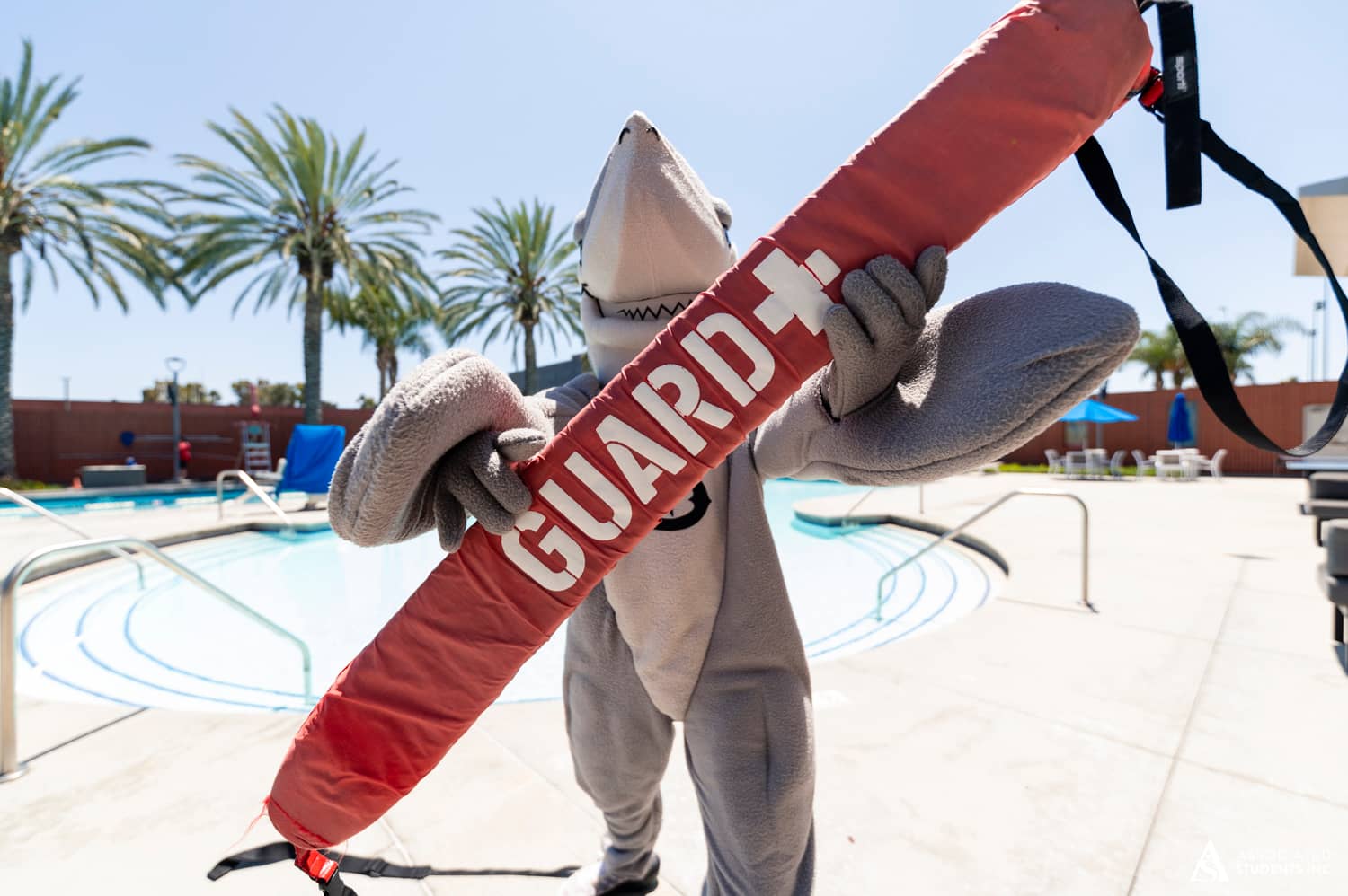 Elbee holding lifeguard floater